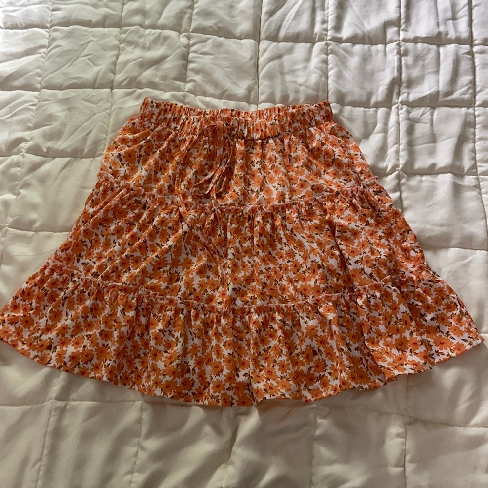 Orange floral mini skirt
